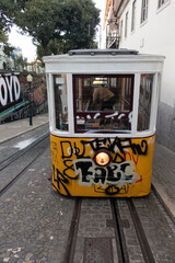 typical tramways circulating through the streets of Lisbon