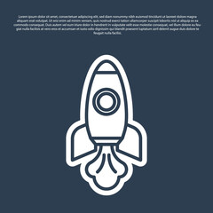Blue line Rocket ship icon isolated on blue background. Space travel. Vector