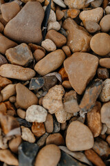 unpolished large pebble stones. wallpaper bakground. High quality photo