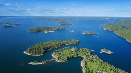 The Finnish Archipelago on day time. Baltic sea on a calm summer day. Many islands. Drone shot. 
 - obrazy, fototapety, plakaty