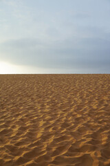 Bright blue sky against a desert 