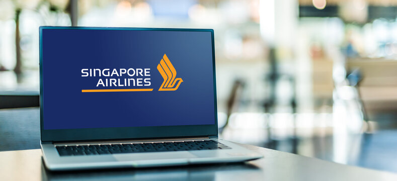 Laptop computer displaying logo of Singapore Airlines