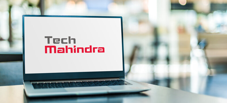 Laptop computer displaying logo of Tech Mahindra