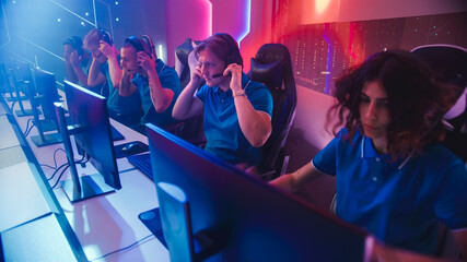 Diverse Esport Team of Pro Gamers Begin Play in Video Game on a Championship, Put on Headsets to...