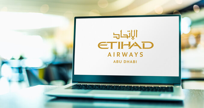 Laptop computer displaying logo of Etihad Airways