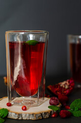 Raspberry tea with fresh pomegranate