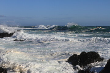 waves crashing on the rocks