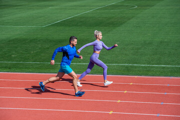 Fototapeta premium energy stamina. fit sporty people jumping. man and woman sport trainer run. fitness couple training