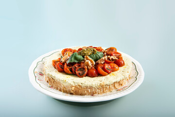 close-up of pesto cheesecake prepared to eat and presented in the center of the table