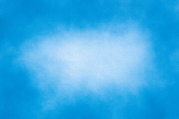 Abstract spray paint blue and white color on center on paper texture background