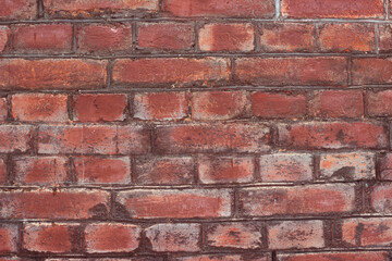 The surface of vintage red bricks. City texture. Old building wall. Text and announcement background.