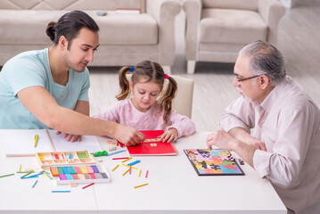 Fototapeta premium Three generations of family in early development concept