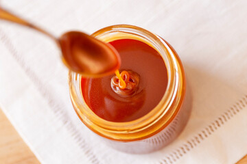 jar of caramel and spoon