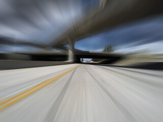 Fototapeta na wymiar Motion blur view of Los Angeles route 118 freeway and route 405 interchange bridges in Southern California.