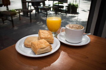 breakfast with coffee and croissant