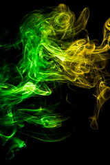 Fototapeta premium Colored smoke on black background