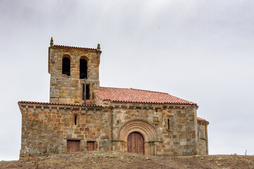 Fototapeta na wymiar Church of San Clemente, Huidobro. Romanesque temple of the XII century. Burgos, Castilla y Leon, Spain