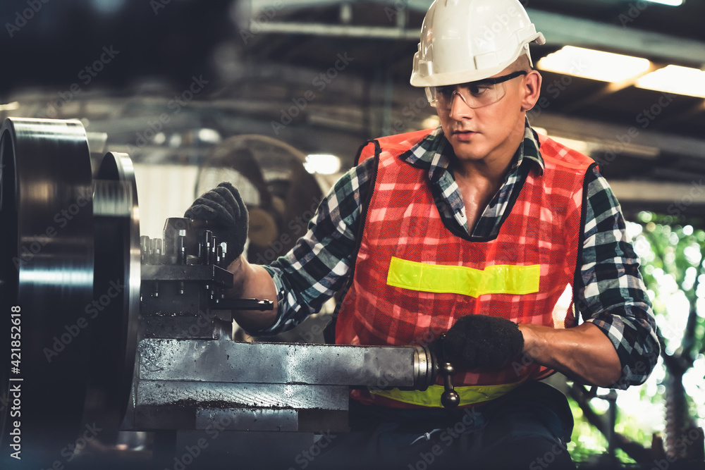 Poster smart factory worker or engineer do machine job in a manufacturing workshop . industry and engineeri