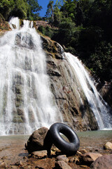 vertical shot of a refreshing cold water waterfall