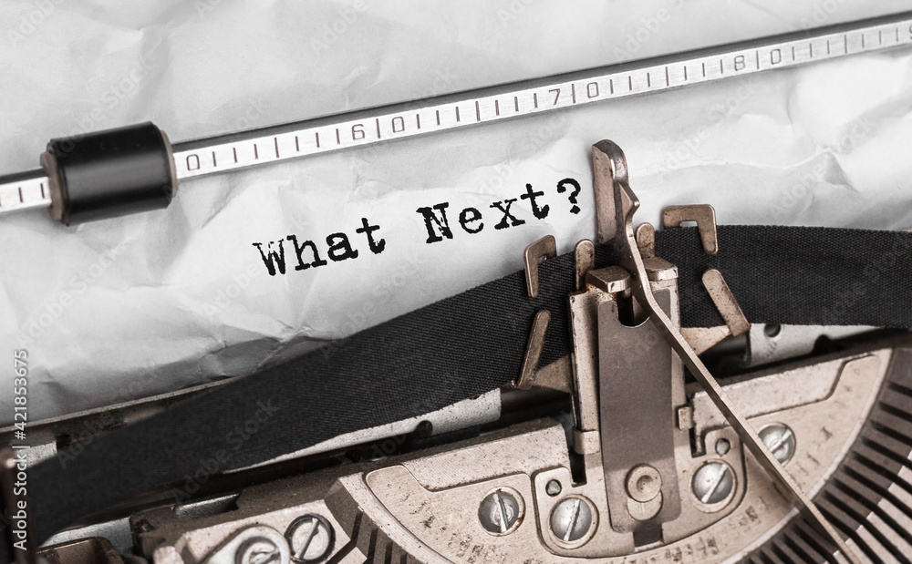 Poster text what next typed on retro typewriter