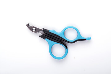 Scissors for clipping cat claws on a white background. Medical manicure with finishing. copy space for text