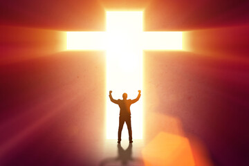 Religious concept with cross and lonely man