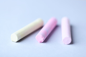 Soft pastels on bright background. Close up.