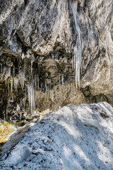 Fototapeta na wymiar Big icicles on the rock, Poludnica, Low Tatras, Slovakia
