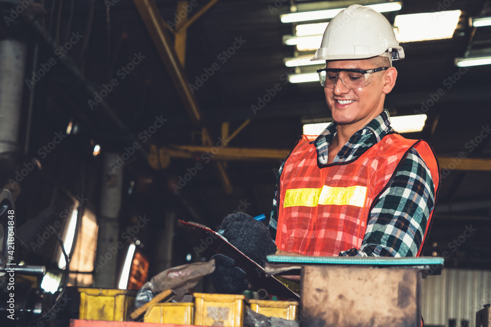 Poster smart factory worker or engineer do machine job in a manufacturing workshop . industry and engineeri