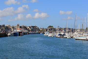 the beautiful harbor of saint-vaast-la-hougue at the french coast in normandy at a beautfiul day in summer
