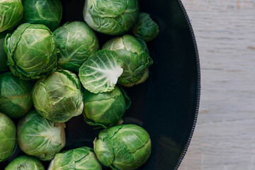 Brussel Sprouts In Metal Bowl On Table