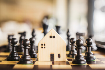 Building and house models in chess game, Business financial district and commercial ,success and...