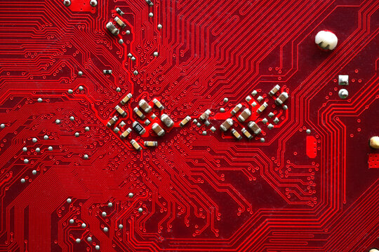 Red Computer Motherboard Chip Close-up With Elements