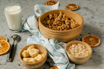 Healthy breakfast - milk with muesli and banana - health and diet concept