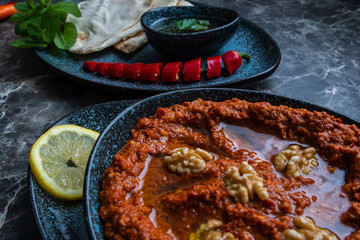 Mhammara is a hot pepper dip originally from Aleppo, Syria , Lebanon found in Levantine and Turkish...