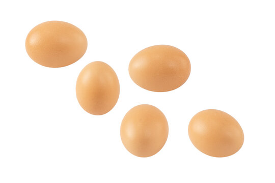 Chicken eggs flying in the air on a white background. Isolated image. Easter theme