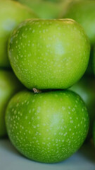 Green apples close up on white background