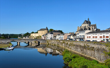 River in the town of Mayenne with Notre-Dame basilica and the castle, commune in the Mayenne department in north-western France