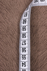 tape measure on a fabric background