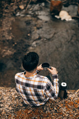 a walk in the woods with a thermos