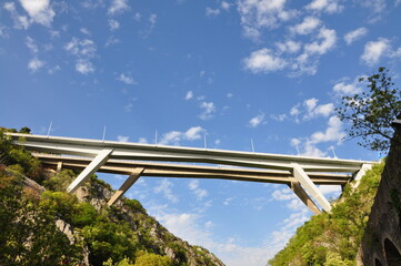 Bridge over the river with sky and clouds in background