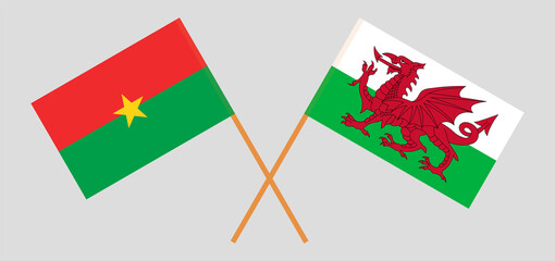 Crossed flags of Burkina Faso and Wales. Official colors. Correct proportion