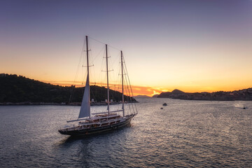 Aerial view on cruise ship during sunset. Adventure and travel. Landscape with cruise liner on Mediterranean sea. Luxury cruise. Travel and vacation image