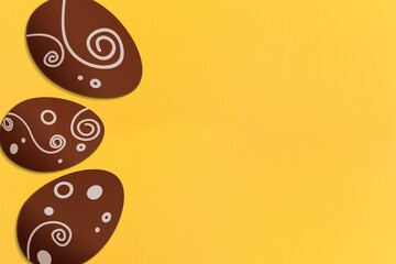 Painted easter eggs on yellow background. Colorful. Paper texture. Illustration.