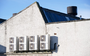 Obraz premium Condenser units for air conditioning system wall mounted outdoors