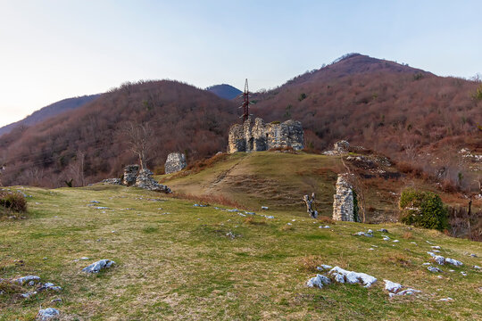 Abkhazia, Gagra district, urban-type settlement Bzyb village Akvara.  9th-10th-century church in ruins and medieval fortress of clan of Inal-Ipa. Destroyed Orthodox Church. Evening mountains landscape