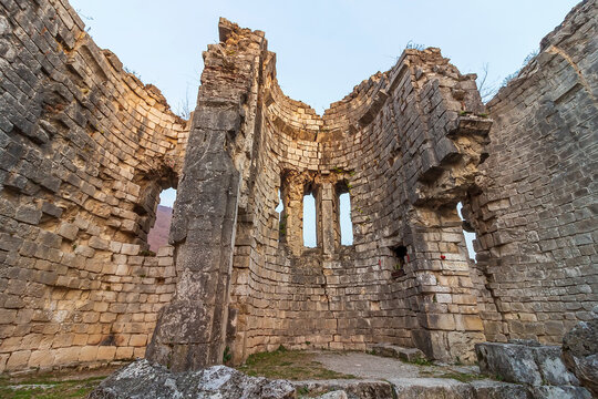 Abkhazia, Gagra district, urban-type settlement Bzyb village Akvara.  9th-10th-century church in ruins and medieval fortress of clan of Inal-Ipa. Destroyed Orthodox Church. Evening mountains landscape