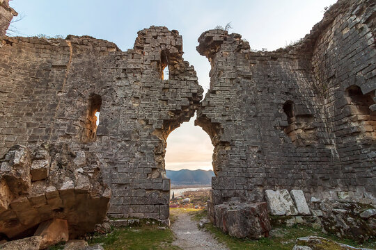 Abkhazia, Gagra district, urban-type settlement Bzyb village Akvara.  9th-10th-century church in ruins and medieval fortress of clan of Inal-Ipa. Destroyed Orthodox Church. Evening mountains landscape