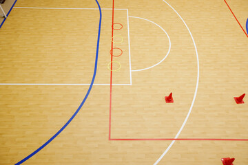 Gym for playing futsal, mini-football. Folded wooden parquet on the field of hall for...