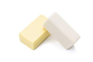 yellow and white soap bars isolated on white background. antibacterial soap bricks cut out